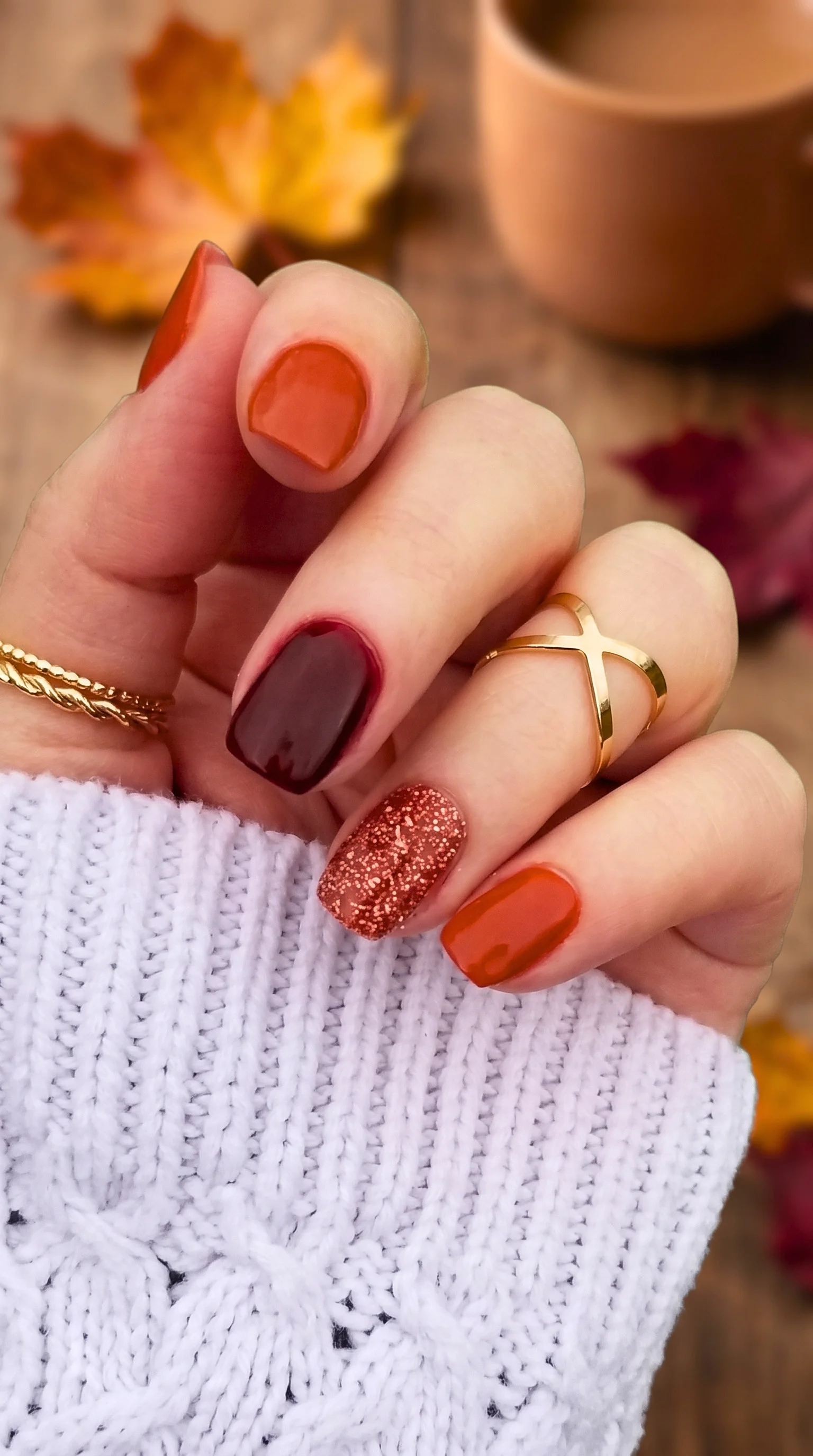 Cozy Orange, Burgundy & Copper Glitter Fall Nail Inspo
