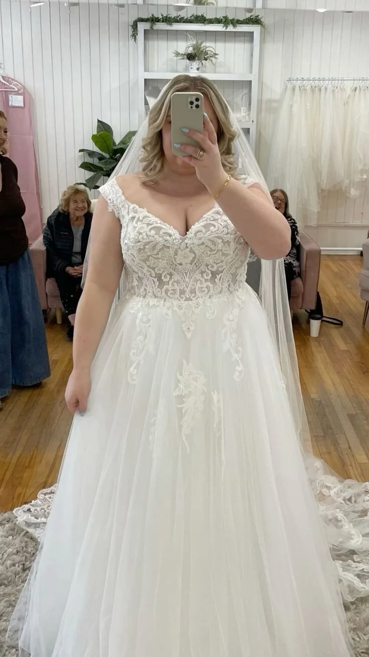 Ornate Sweetheart Neckline with Flowing Train